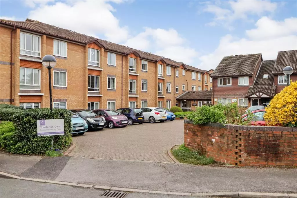 Chesterton Court apartment building with parking